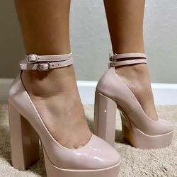 Baby pink platform heels 