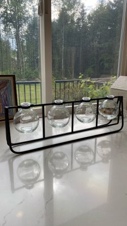 4 glass vases in metal holder