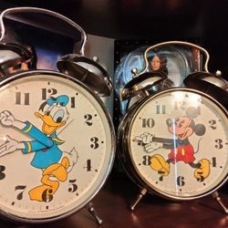 Donald Duck Or Mickey Mouse Medal Alarm Clock Battery From The Early '70s Works Great Very Heavy Large $150 Each Unless You Buy Both I'll Go Cheaper