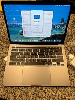 2022 MacBook Pro 13-inch M2 Chip touchbar 256gb ssd 8gb ram macOS Tahoe Works Great. Comes with charger
