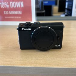 Canon E0S M100