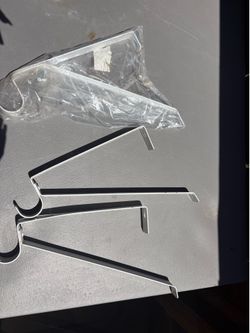 3 -Adjustable shelf & rod brackets.-new