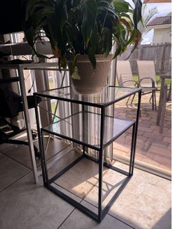 Two glass end stands