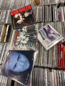 RECORDS 45’s  AND CD’s