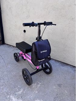 Pink knee scooter