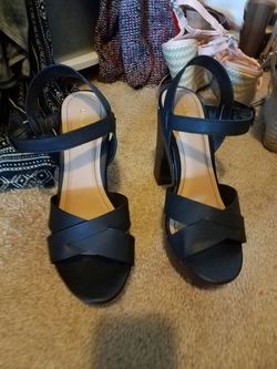 New with wood bottom heels