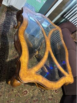 Burl wood and beveled glass coffee table
