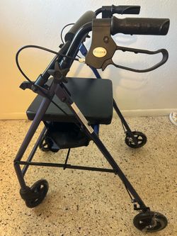 Medical adult walker new  has brakes seat storage underneath