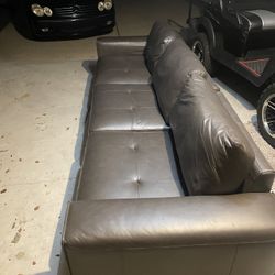 Leather Couch 8 Ft. From Rooms To go