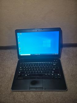 Dell 14 inch laptop i5 8gb 300gb HD with Ms office with charger