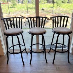 Brown Swivel Bar Stool, Cushioned with Metal Frame and Footrest - Used Good
