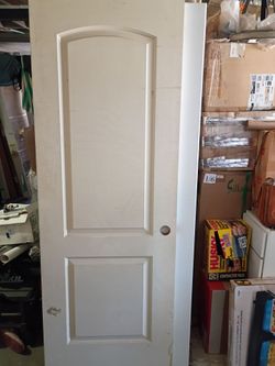 28x80 left hand interior door solid core,some stains water no damage