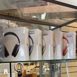 AirPods Max <.  $1 Down >