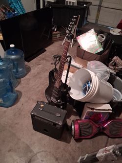 Electric guitar with amplifier