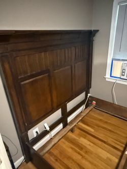 Queen bed frame. Head board and footboard and rails. Heavy and sturdy