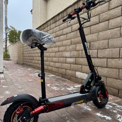 Double shock-absorbing electric scooter