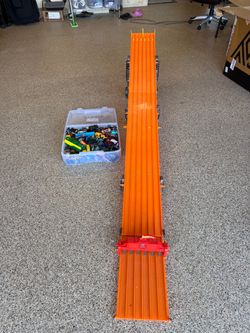 Hot wheels track and cars plus Disney cars