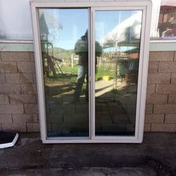 Window- DG  XO  62 1/2 X 47 1/2   Bronze Glass