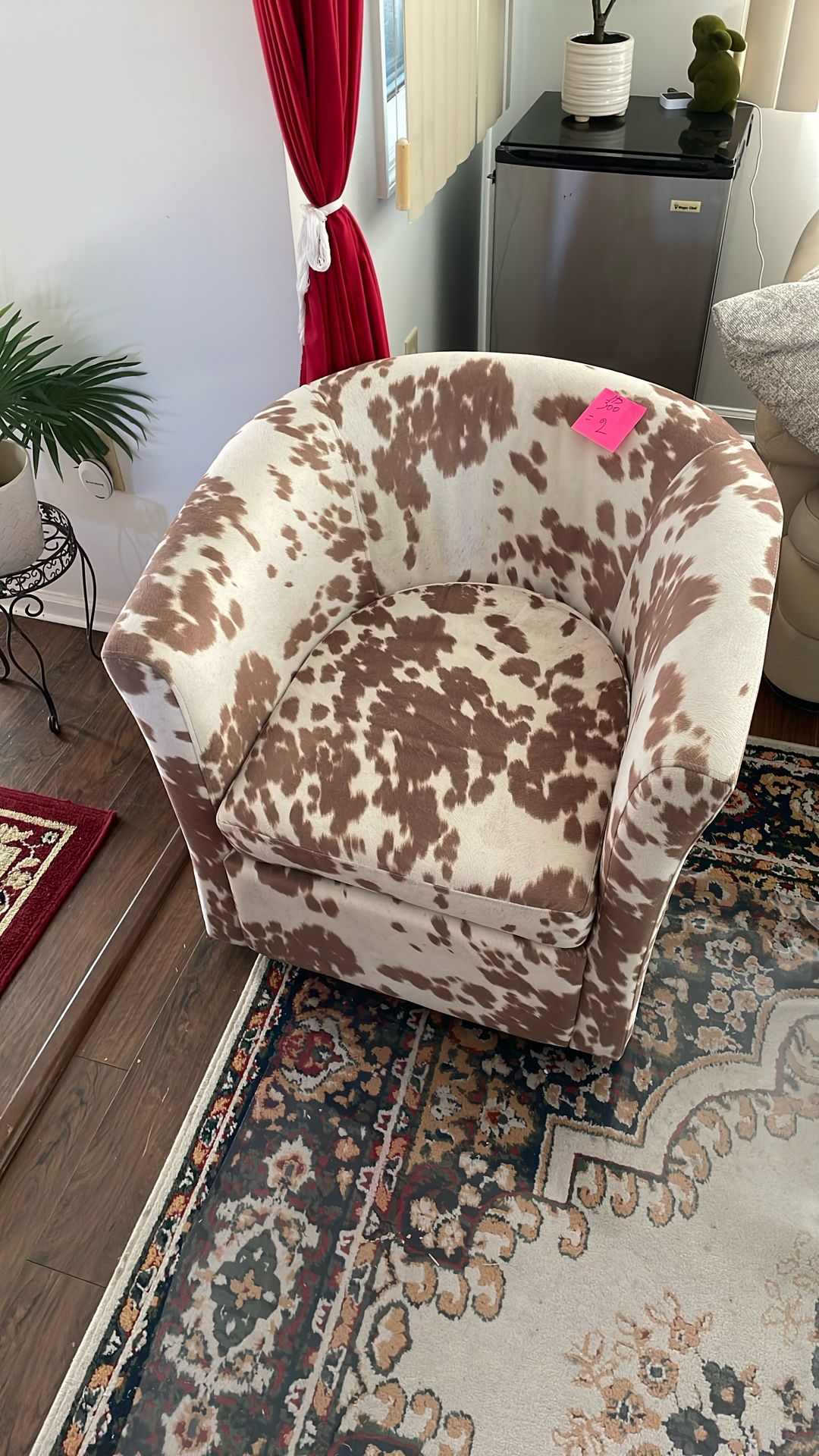 2 Matching Cow Hide Swivel Chairs