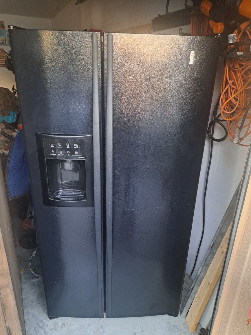 GE Side By Side Black Refrigerator And Freezer