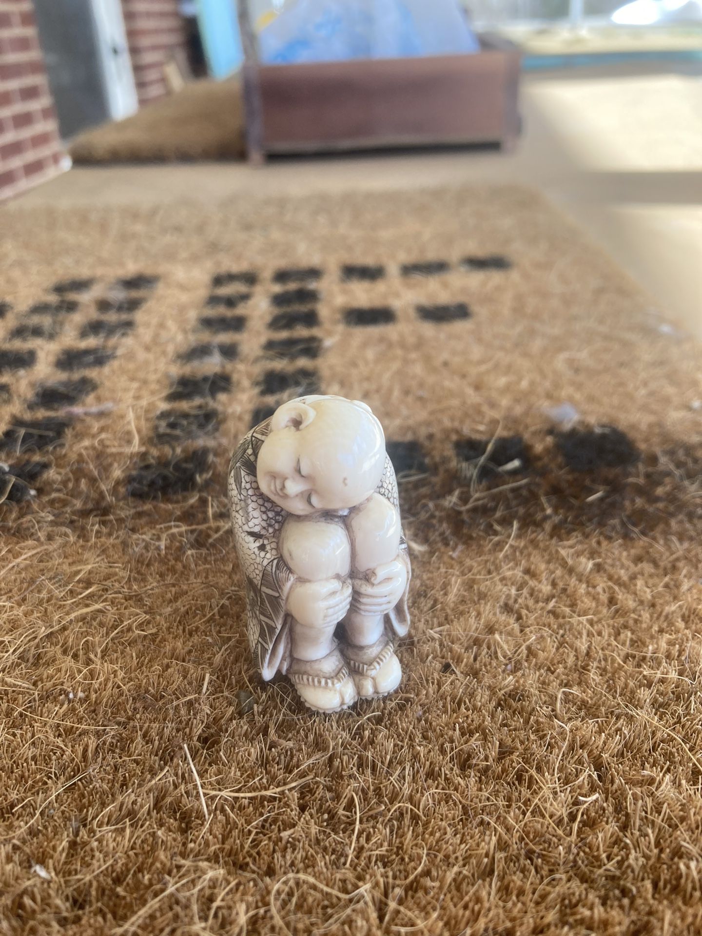 Small Craved Japanese Figure