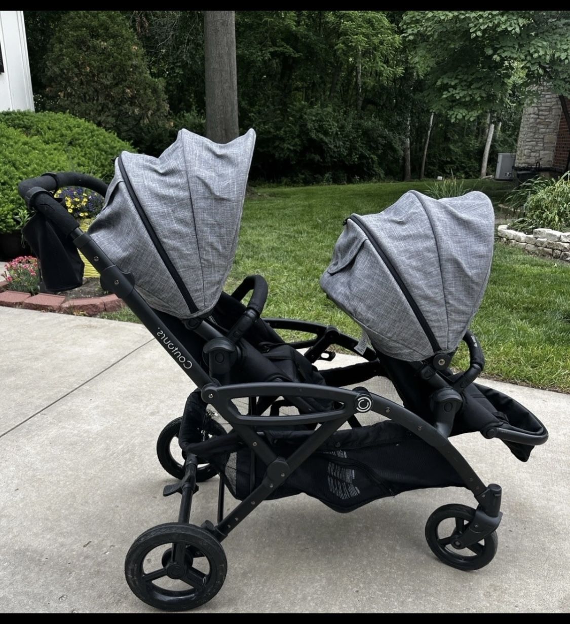 DOUBLE STROLLER CONTOUR ELITE TANDEM. EAZY OPEN/close seats easily come off Has large storage basket underneath FIRM PRICE IN EAGLE ROCK