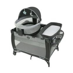 Graco Playpen with bassinet dome and changing table.