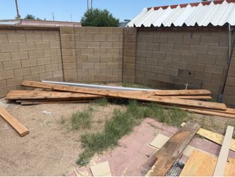 Various wood posts and large planks - pick up today