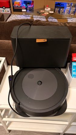 iRobot Auto Charging and Self Emptying Roomba Vacuum