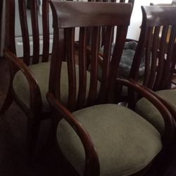 Five Solid Wooden Chairs Great Condition Also Have A Outside Iron Chair And Table Set Comes With Two Chairs And One Table