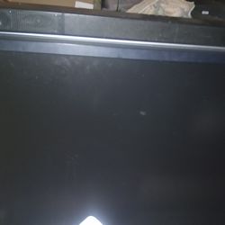 Large Flat Screen TV With Sound Bar