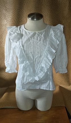 White Ruffled Blouse The impeccable pig 