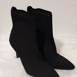 Women's Black Stretch Boots 4" New Condition 