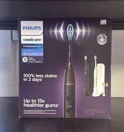 Sonicare Philips power toothbrush black and white pair