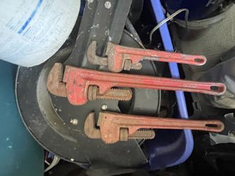 Three pipe wrenches