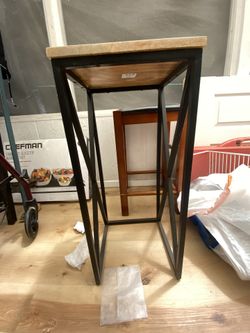 $8.00 Ea Square Wooden & Steel 13x27” T, Square Wood & Black Leather 14x24”T, Round Aluminumm Chair21” T