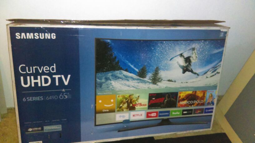 Brand new in the box 65 inch Samsung curved 4K Smart TV