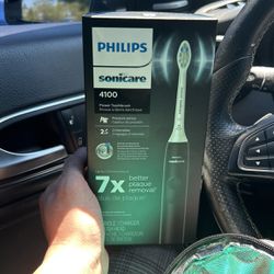 Dental Supplies Philips sonicare 4100 And Quip Portable Water Flosser