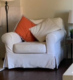 White Slipcovered Armchair
