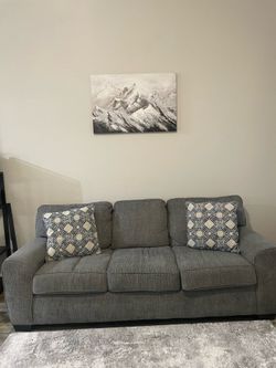 Like-New Grey 3-Seater Sofa / Couch (Pillows Included) 84" Width x 37" Depth (Standard 3-seater size).