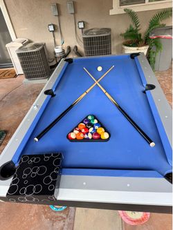 Pool table with cover
