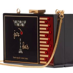 Perfect Match Matchbox Resin Mini Frame Clutch Crossbody de la marca Kate Spade New York.