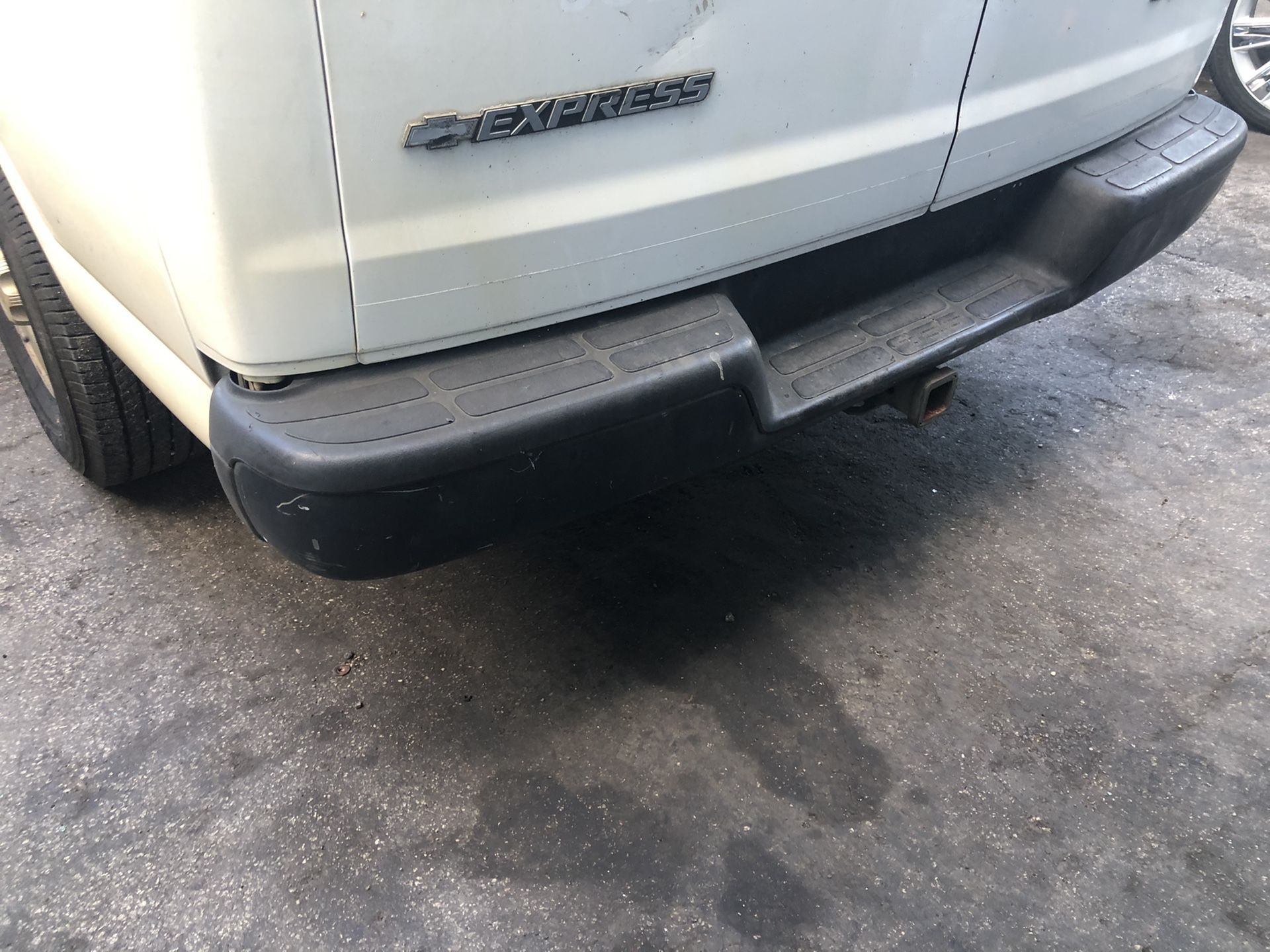 Express van rear bumper complete with all mounting hardware and plastics moldings and brackets all OEM GM parts GMC Savana