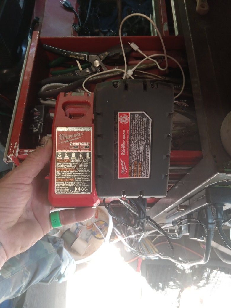 Milwaukee M12 M18 Battery Charger And A Xc6.0 High Output Battery