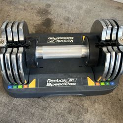 One Set Reebok Adjustable Weights. 5, 10, 15, 20, 25 Lbs. 