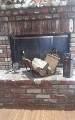 Cast iron firewood stand with leather sling plus accessories