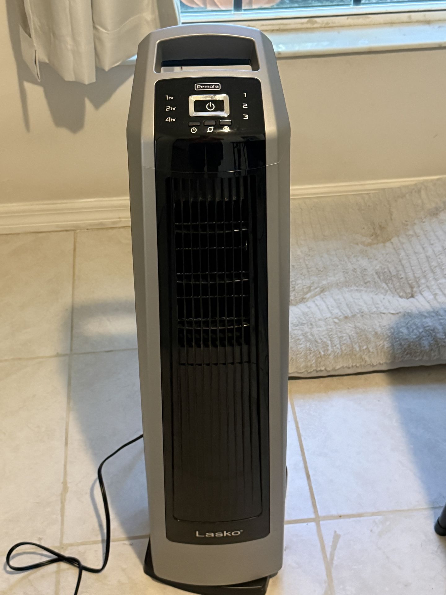 Lasko High Velocity Oscillating Tower Fan for Bedroom, Garage, Basement, and Gym with Remote Control, Timer, 3 Powerful Speeds, 35"
