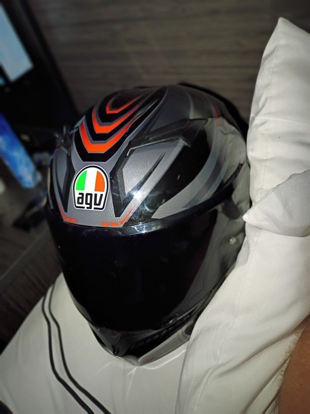AGV Grey, Black, And Red Motorcycle Helmet