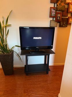 Philips 32-inch LCD HDTV (Model No. 32PFL3504D/F7) with stand