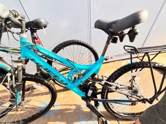 Two HUFFY bicycles black and blue